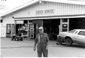 Longtime Paxico, Kansas businessman, Eddie Meinhardt is seen here in front of his service station located at Newbury and Main Streets in Paxico. Photo courtesy the Eddie Meinhardt family.