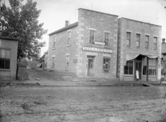 This Gus Meier photo, circa 1891-1899, shows the Alma Signal newspaper building, left, and Phil Birk's Meat Market. This photo was created from the lost attic negatives courtesy Paul Gronquist.
