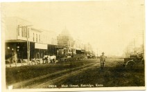 This view of Main Street in Eskridge, Kansas looks to the north from the 200 block in this Zercher Photo view from about 1907.