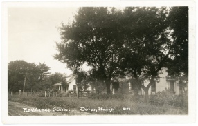 This residential view postcards shows homes on SW 57th Street in Dover, Kansas.