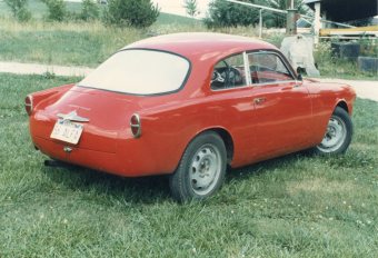 The original plastic rear window of this 1956 Alfa had turned a spooky milky-white color by the time I purchased the car in 1983.